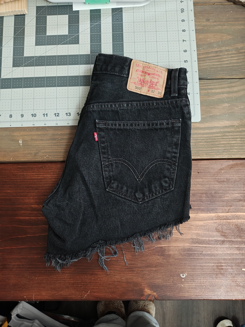 Levi's Black Denim Cutoff Shorts with Frayed Hem